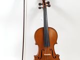 an old violin with a bow and bow rest on a white background