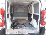the back of a van with the door open and the back of the van with the door open