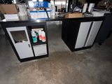 two black and white cabinets in a garage