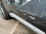 a close up of a car ' s door handle and door handle