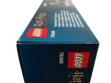 a box of legos sitting on a white surface