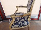 a chair that is sitting in front of a window