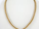 a gold chain necklace on a mannequin mannequin mannequin mannequin mannequin mannequin mannequin mannequin manne