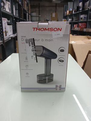 a box on the table with a hair dryer in it