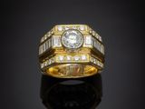 a diamond and eighteen karat gold ring