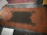 a rug on the floor in a living room