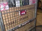 a large metal cart with a lot of boxes in it