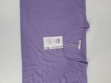a close up of a purple shirt with a tag on it