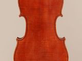 an old violin with a very long neck and a very long back