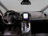 the interior of a car with a steering wheel, dashboard, and dash board