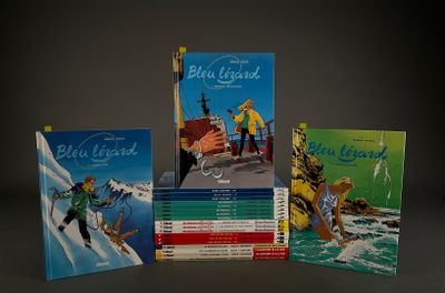 several children ' s books are lined up on a table