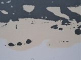 a black and white picture of a painting on a wall