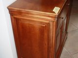 an image of a wooden cabinet in a living room