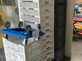 many crates stacked on top of each other in a room