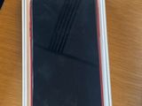 a box that has a phone in it on a table