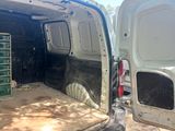 an image of a van with the door open