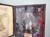 a picture of a box with a toy figure inside of it