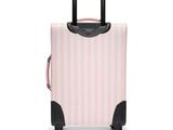 pink and white striped suitcase on wheels against a white background