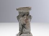 a small vase that is sitting on a table
