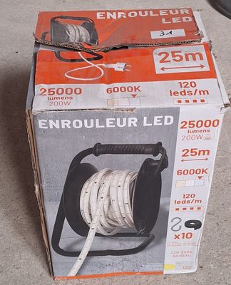 a box that has a hose in it on the ground