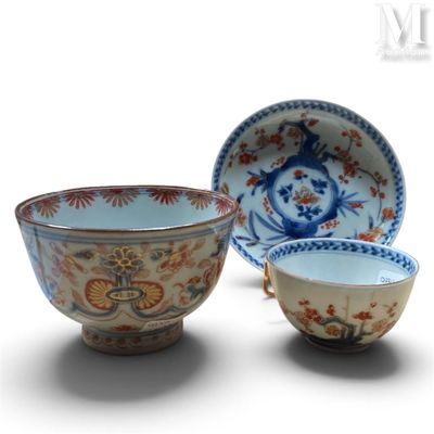 two bowls and a bowl on a white surface with a white background