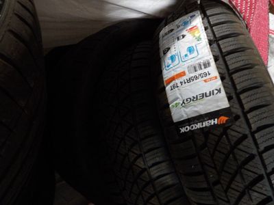 two tires that are sitting next to each other