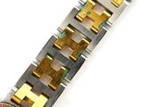 an image of a close up of a wrist watch on a white surface