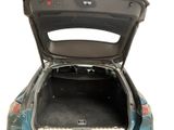 the back of a car with its trunk open and the back of it ' s trunk open