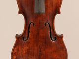 an old violin with a bow on a white background