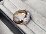 a diamond ring sitting in a box on a table