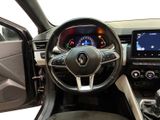 a picture of the interior of a car with a steering wheel and dashboard