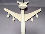a model of an airplane that is on a table