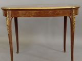 an image of a small table with a wooden top