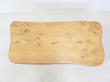 a wooden table that has been made to look like it has been made out of wood