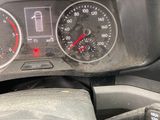 a close up of a car dashboard with a speedometer and gauges