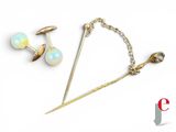 two pairs of gold - plated pins and a pair of opalite earrings