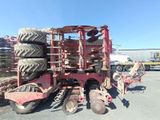 an image of a tractor with tires on the back of it