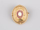an 18k yellow gold, ruby and diamond ring