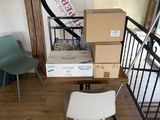 a stack of boxes sitting on a table in a room