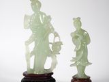 paire de figurines en jade sculptées représentant une femme et un homme