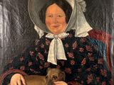 painting of a woman in a bonnet with a dog in her lap