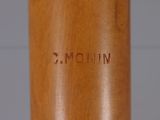 a close up of a baseball bat with a name engraved on it