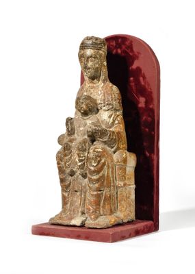 statue of a woman holding a child and a child in her lap