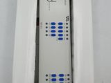 an open box with a remote control in it sitting on a table