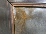 a close up of a picture of a brown frame