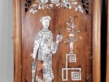 pair of antique chinese carved wood plaques of a man and a woman