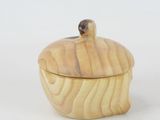 wooden box with a lid made of wood with a bird on top