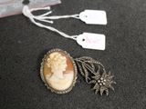 a necklace with a picture of a woman on it