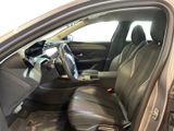 the interior of a car with the door open and the seat up