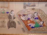 a picture of a painting of a man and a woman sitting at a table